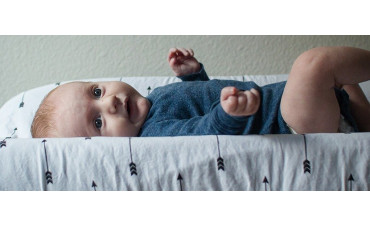 Focus on the wall mounted changing table Welcome Family